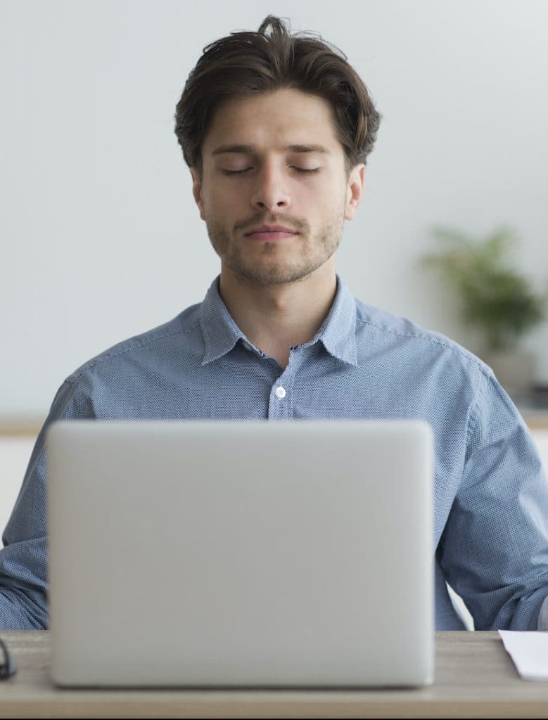 Man taking an Online Mindfulness-Based Stress Reduction course